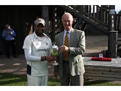 Captain Swapnil Rane receives the 3 Counties Cup from SPCU President Ian Cran